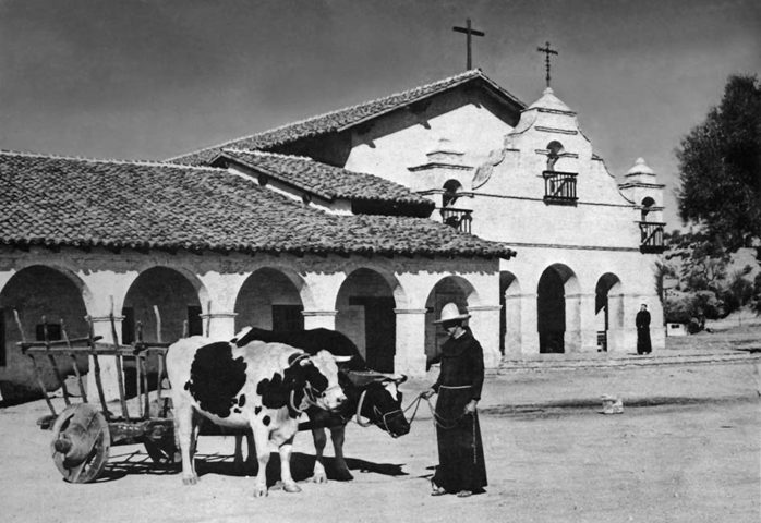 A Franciscan With a Caretta at Mission San Antonio, by Victoria and John Crumps